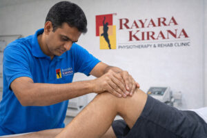 Physiotherapist performing hands-on knee therapy for arthritis pain relief at Rayara Kirana Physiotherapy and Rehab Clinic in India.